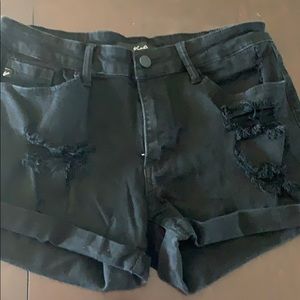 Black distressed jean shorts